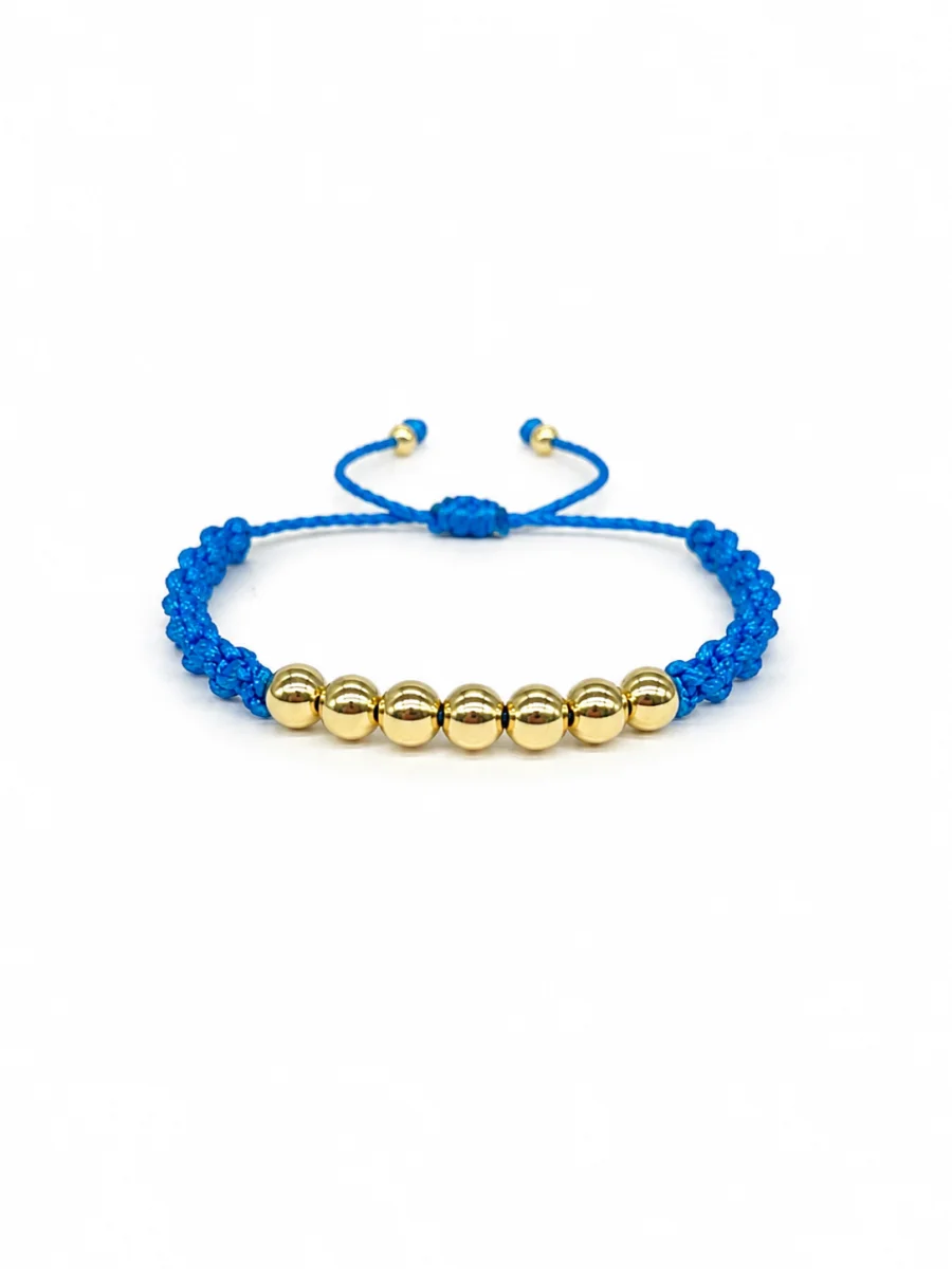 Pulsera azul rey balines oro